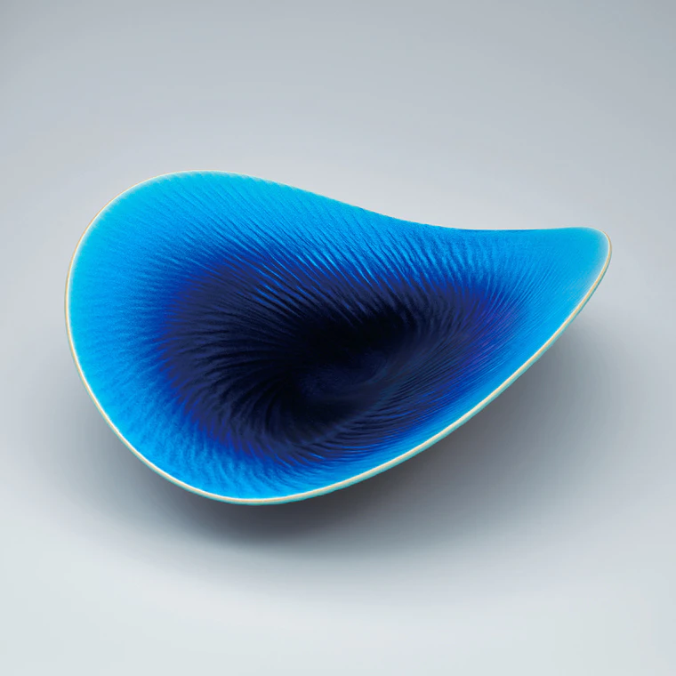 photo Vessel with blue glaze and ripple design  “Endless”