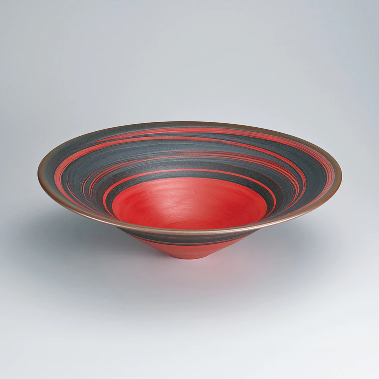 photo Bowl with iron glaze and red circle design