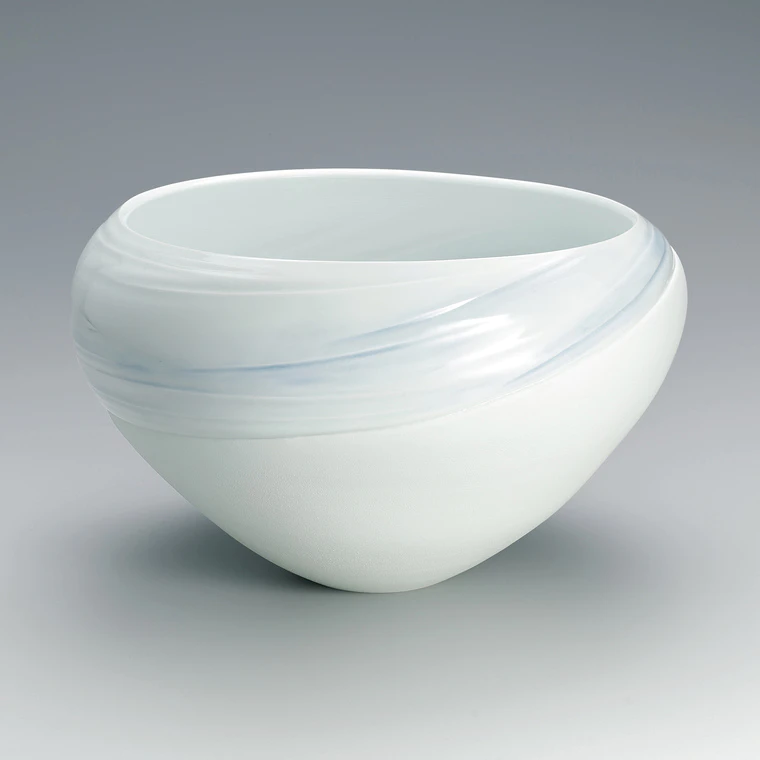 photo White porcelain flower vessel with pale blue gaze and engraved design “Wind and light 2024”