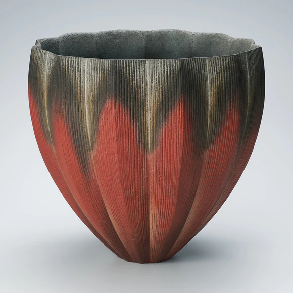 Vessel with engraved lines and colored slip painting