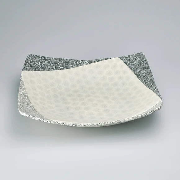 Dish with marbled blurred design