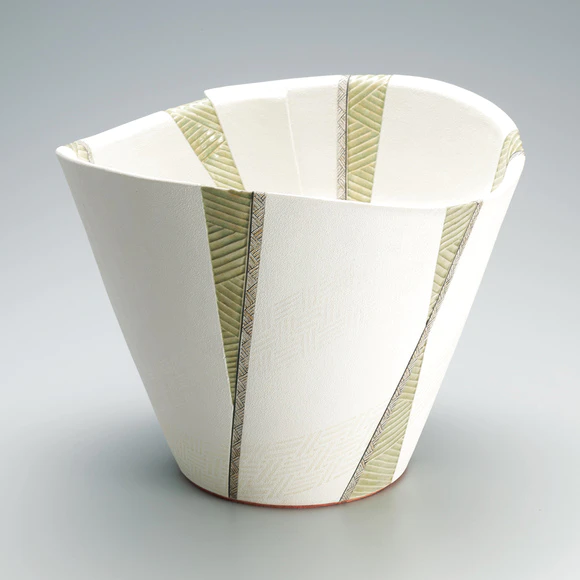 Flower vessel with design in colored slip
