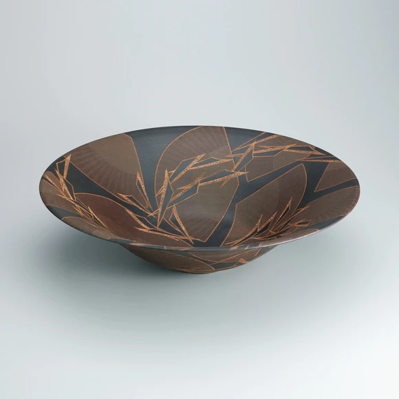 Bowl with black glaze in kakewake style and inlay