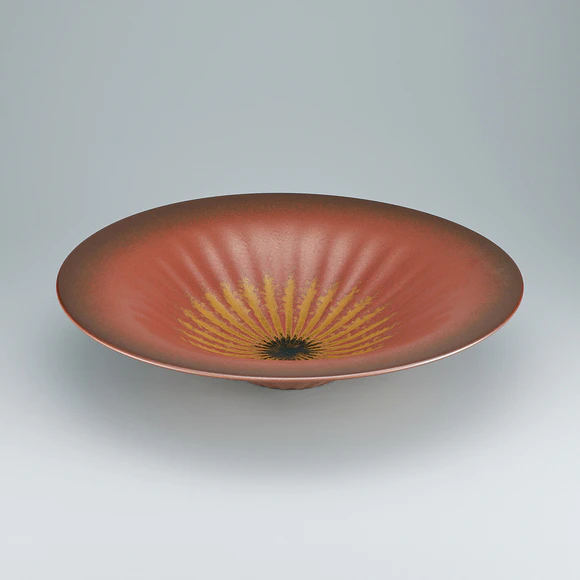 Bowl with iron glaze and ridge design