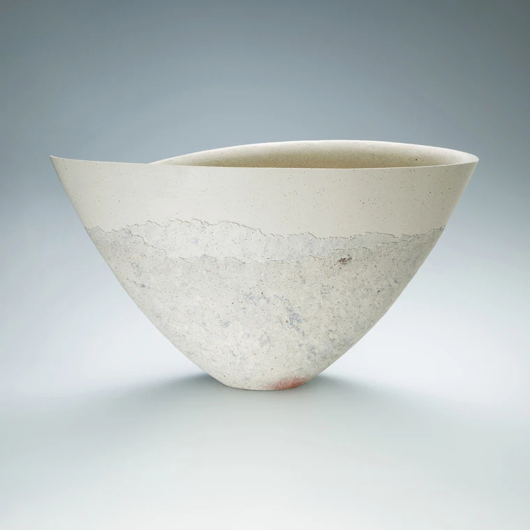 photo Bizen flower vessel of mixed clay with white slip.