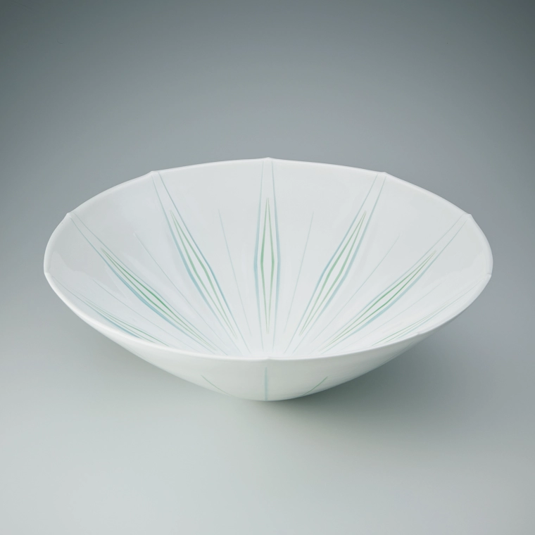 photo Bowl with engraved design and glaze inlay.