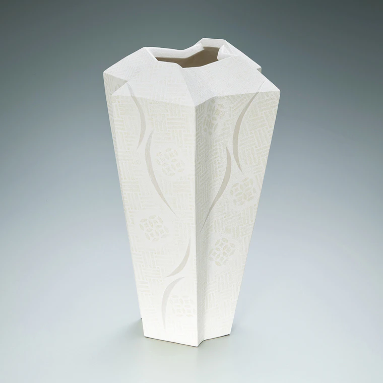 photo Irregular shaped jar with design in colored slip. “Snow pavilion”