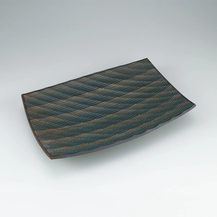 photo Rectangular dish with line inlay, ridge decoration and charcoal finish.