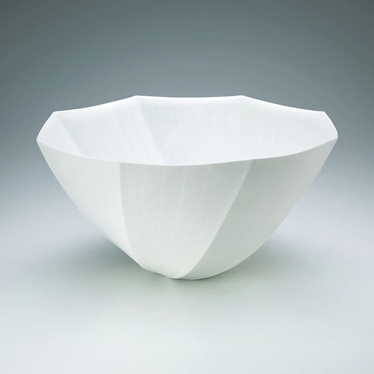 photo Flower vessel with glaze inlay.