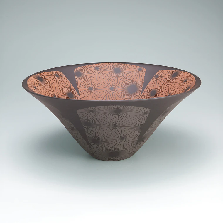 photo Banko brown bowl with line engraved design.