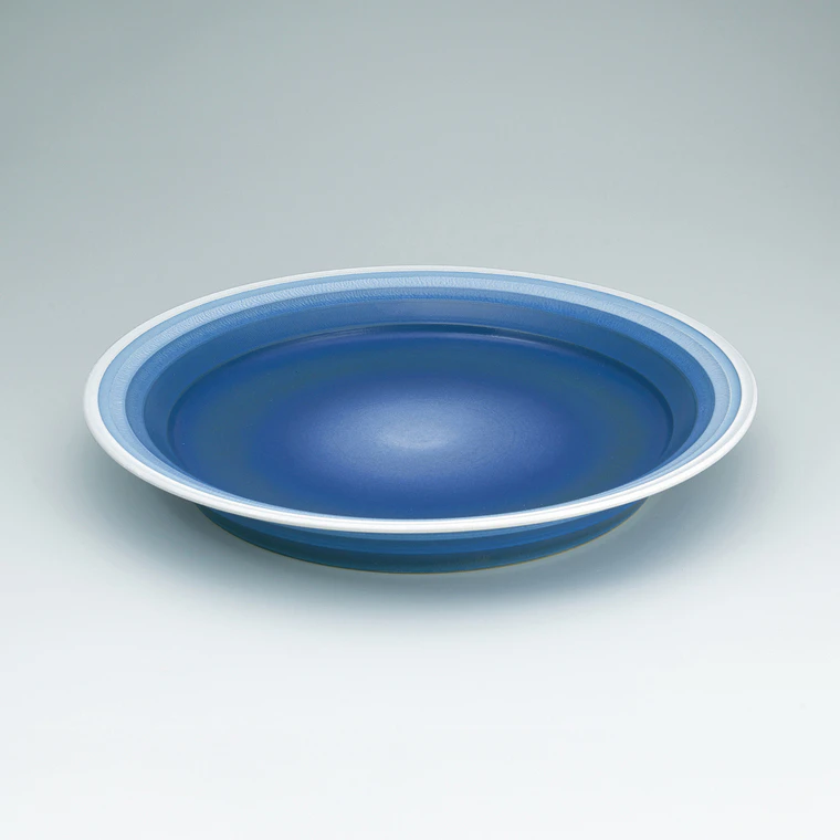 photo Blue matte flat dish in kakewake style.