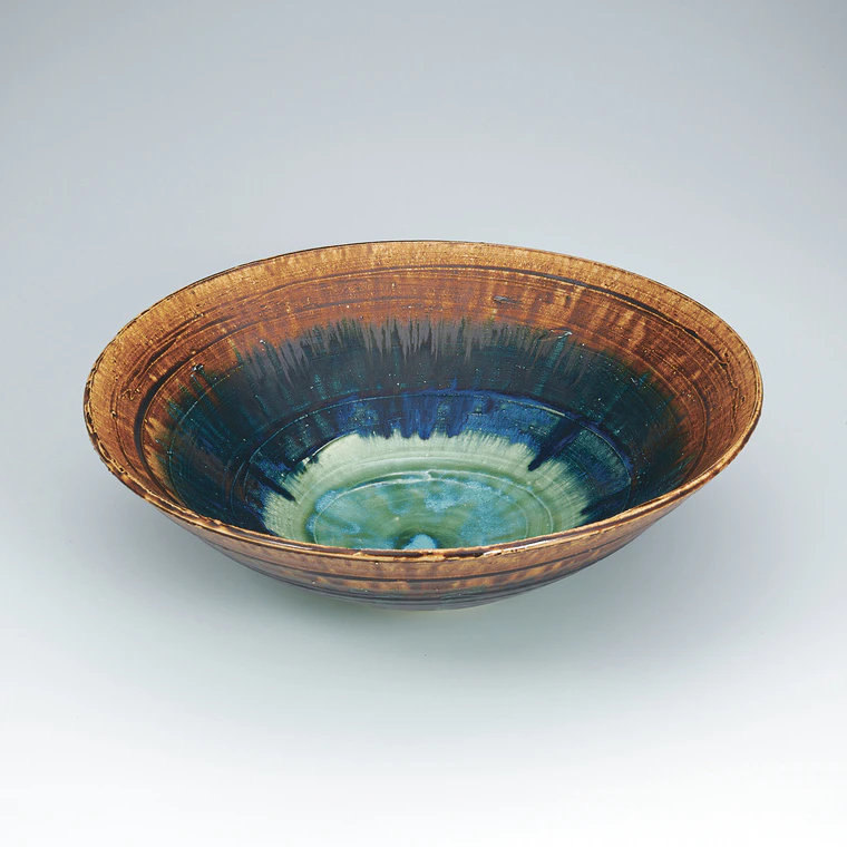 photo Bowl with three color glaze decoration.