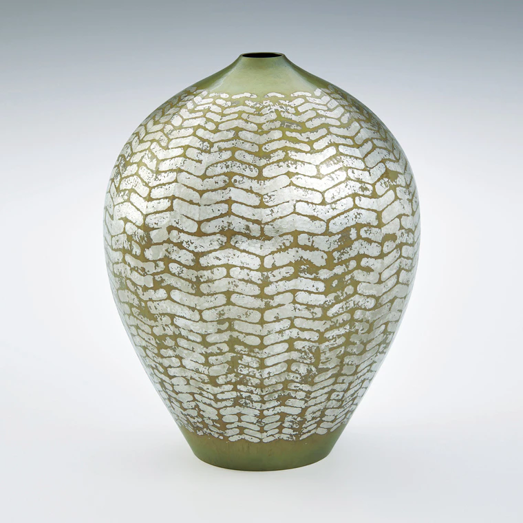 photo Flower vessel of forged brass with silver decoration.