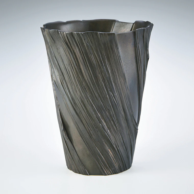 photo Flower vessel cast in cire perdue method.