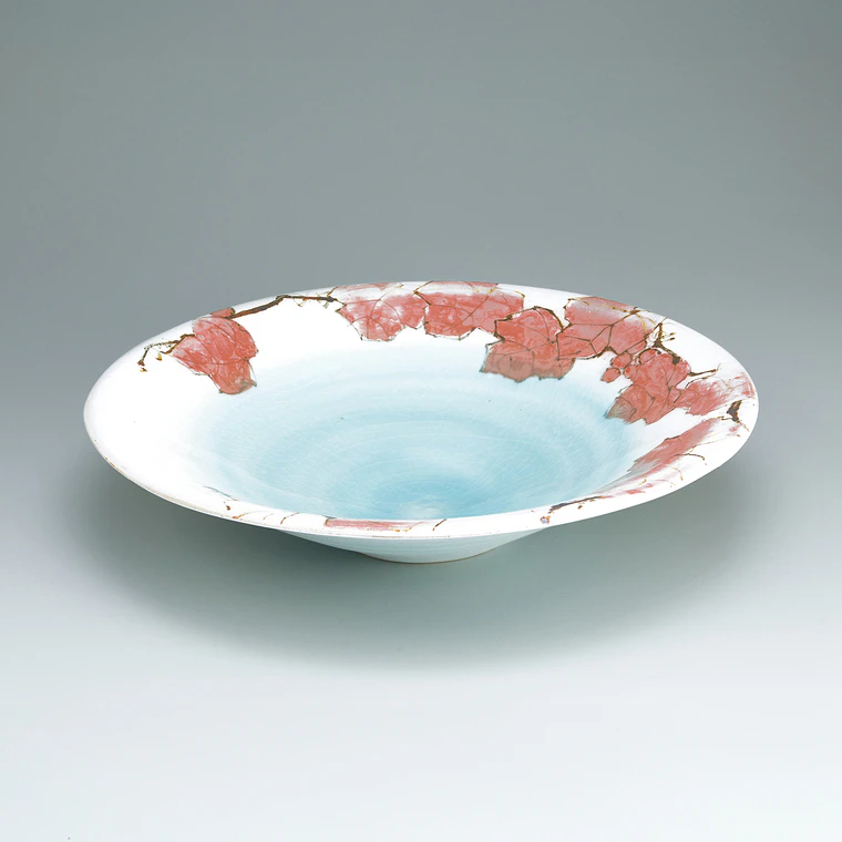 photo Large bowl with grape design in underglaze iron and copper.