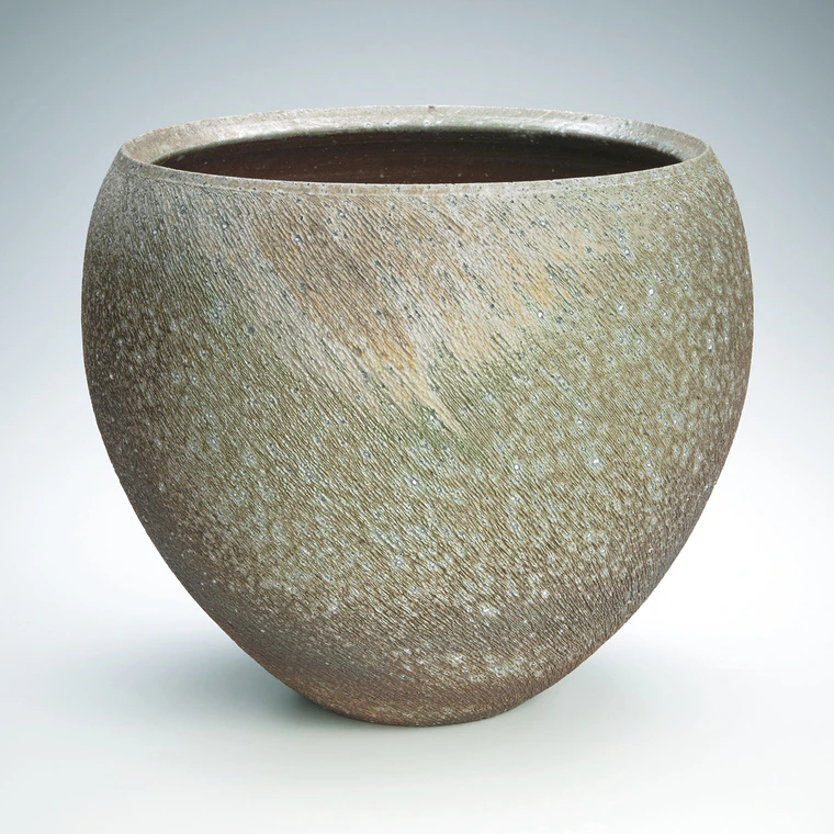 photo Wide mouth flower vessel with kiln mutation effect.