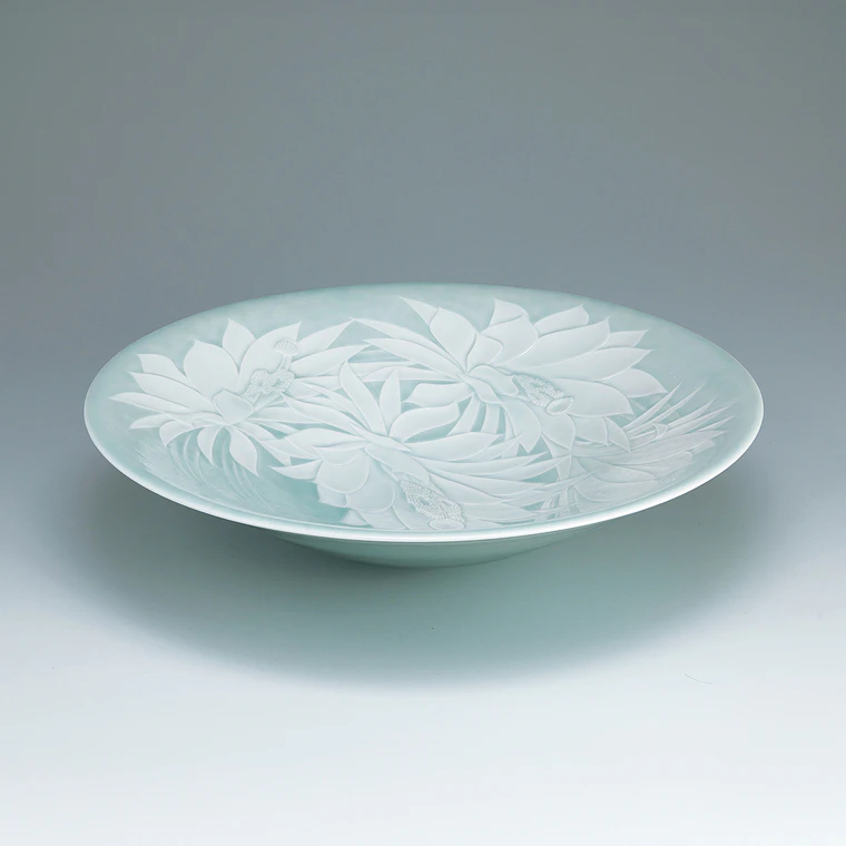photo Bowl with design of Dutchman’s pipe cactus in intaglio.