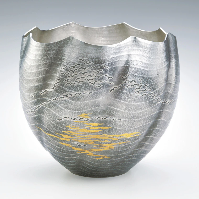 photo Flower vessel of hammer worked silver. “Crossing the sea”