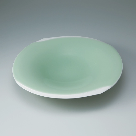 Bowl with pale green celadon glaze.