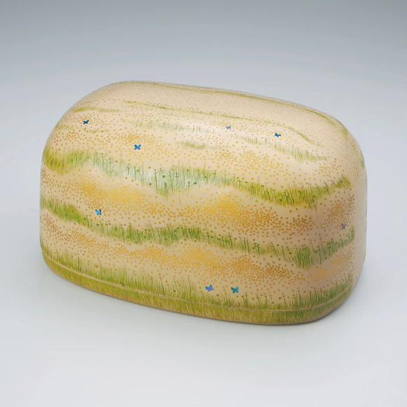 Box with brook design in chinkin.