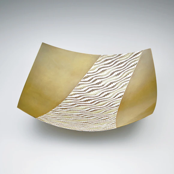 Vessel made of braided wire joined by heat welding method. “Crest of wave”