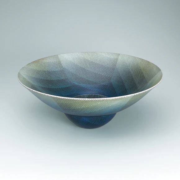Green jade colored bowl. “Prism”