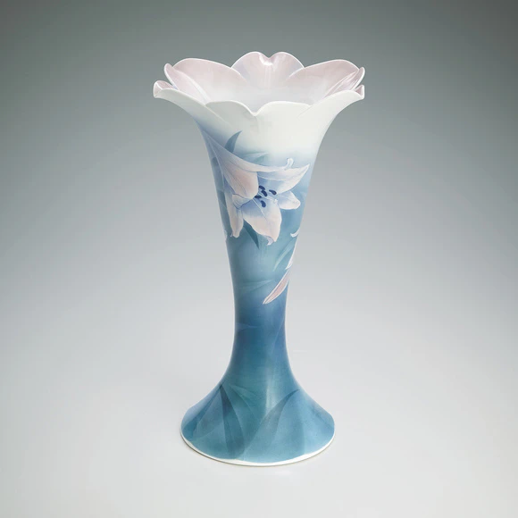 Bottle with underglaze blue design. “Bamboo lily”