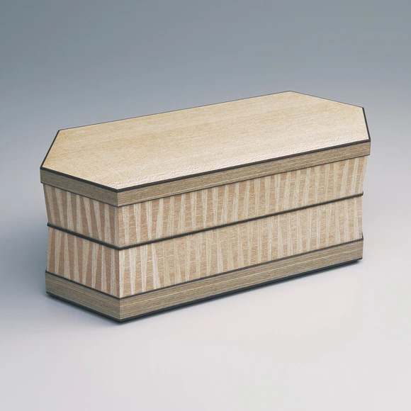 Hexagonal coffer of elm wood with design in marquetry.