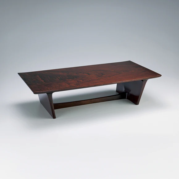 Low table of black walnut wood.