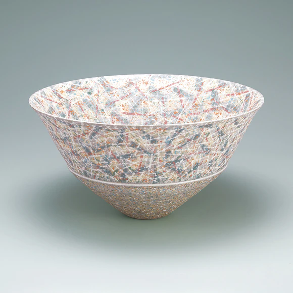 Bowl with tangled string design in colored slip.