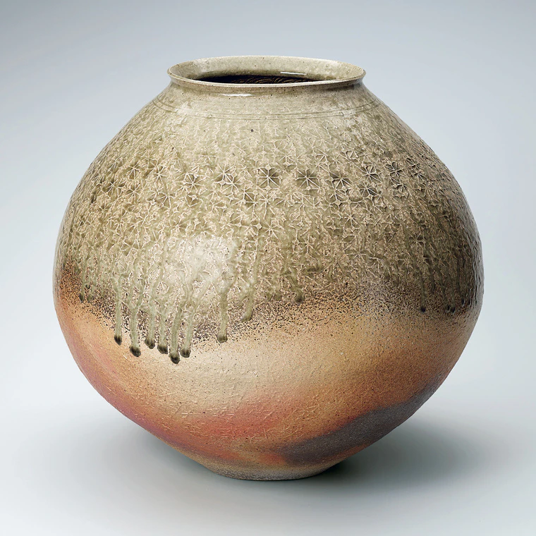 photo Jar Made by Beating and with Ash Glaze