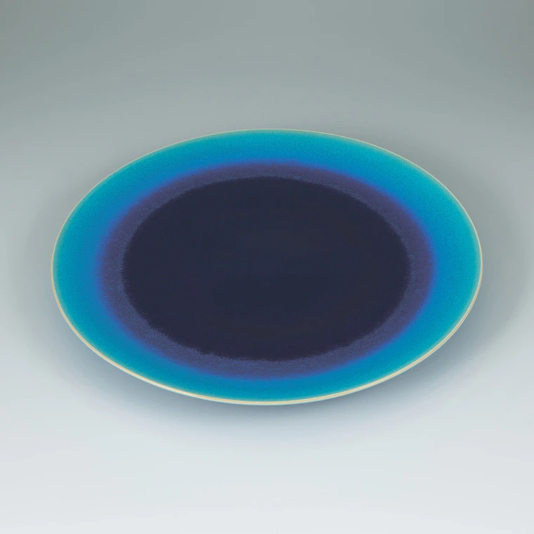 photo Vessel with Blue Glaze and Ripple Design “Blue Hole”