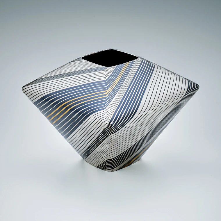 photo Pyramidal Shaped Flower Vessel of Forged Metal Joined by Heat Welding Method
