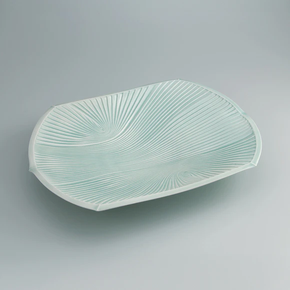 White Porcelain Six-sided Bowl with Pale Blue Glaze and Ridged Groove Design