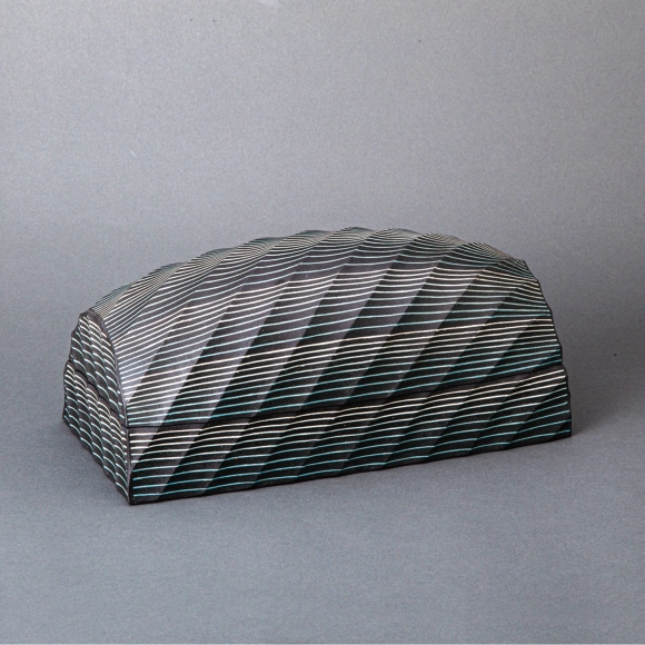 Box with ridged line design and line inlay in charcoal finish "Ripples"