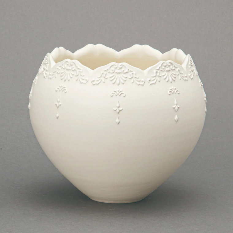photo Vessel with White Slip Relief Design