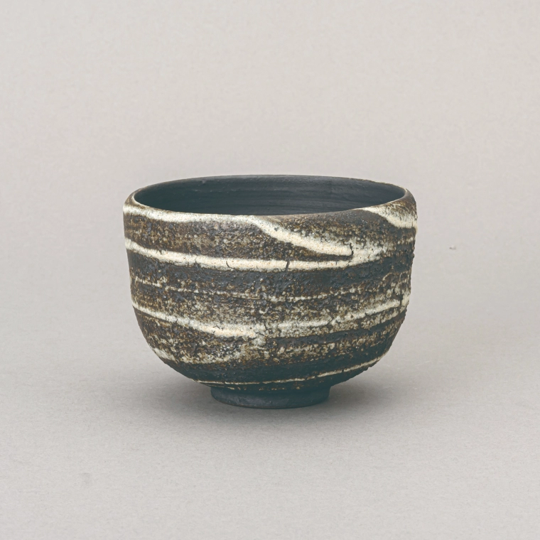 photo Tea Bowl with White Clay Decoration
