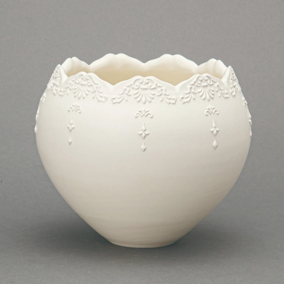 Vessel with White Slip Relief Design