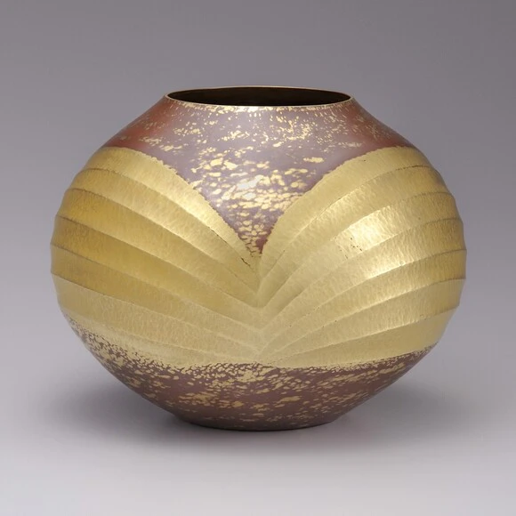 Hammered and Polished Jar with Gold Decoration