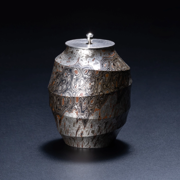 photo Tea Bowl of Mokumegane with Ridge Design Made in Hammer Work