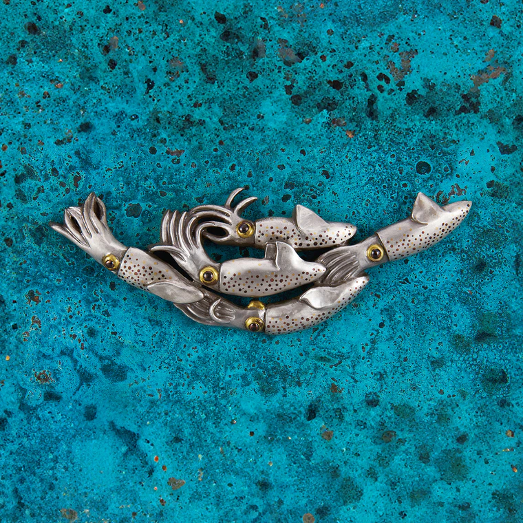 photo Metal Fitting in Shape of Firefly Squid