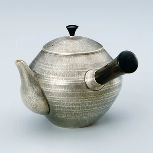 Teapot of Silver Made by Hammer Work