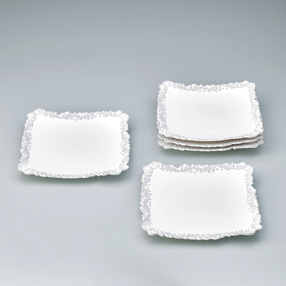 Set of Plates with Raised Colored Slip Decoration