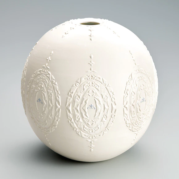 Jar with Raised Colored Slip Decoration