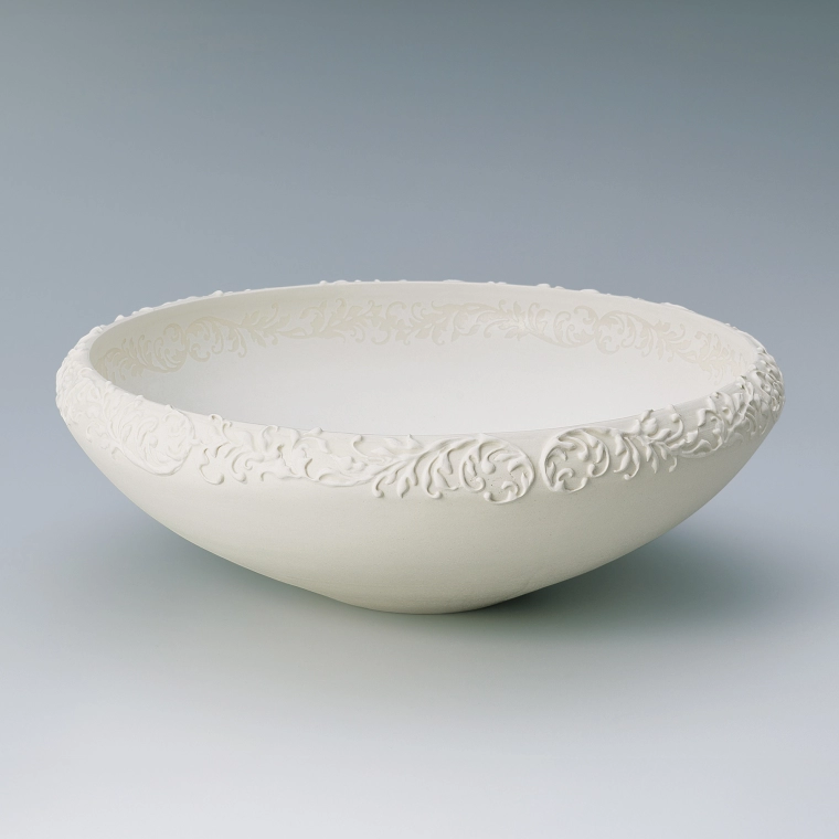photo Bowl with White Slip Relief Design