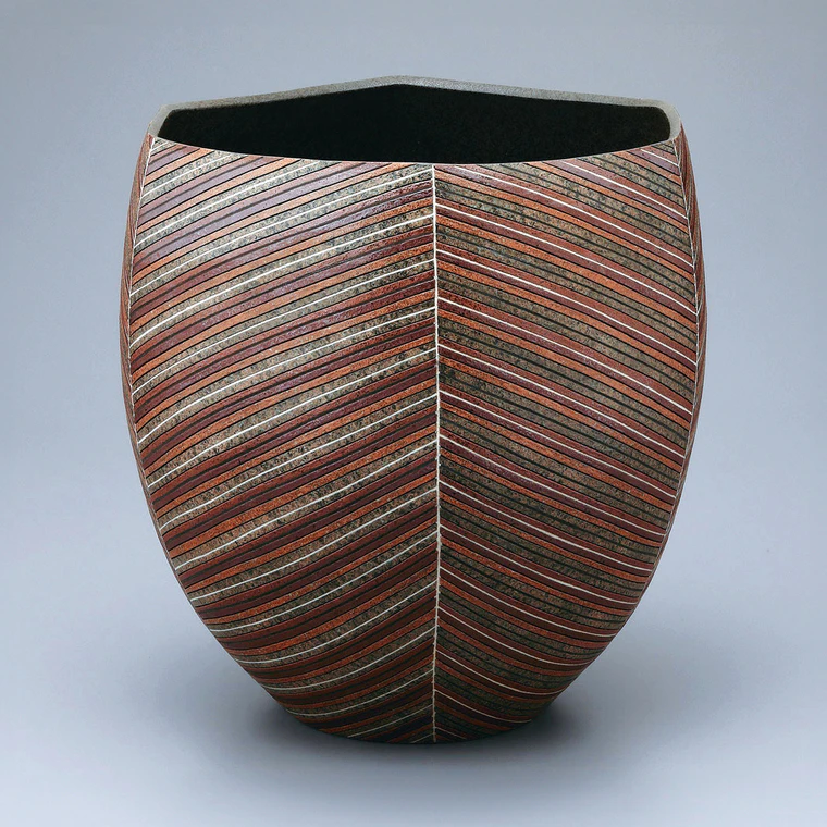 photo Flower Vessel with inlay and colored slip decoration