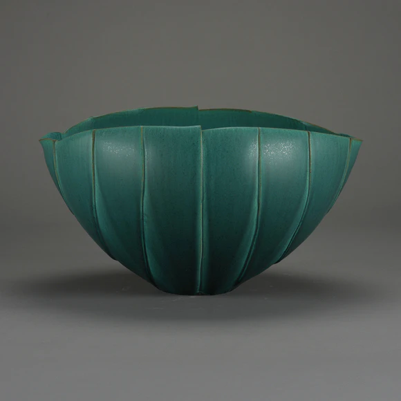 Large Green Bowl with Vertical Stripe Design