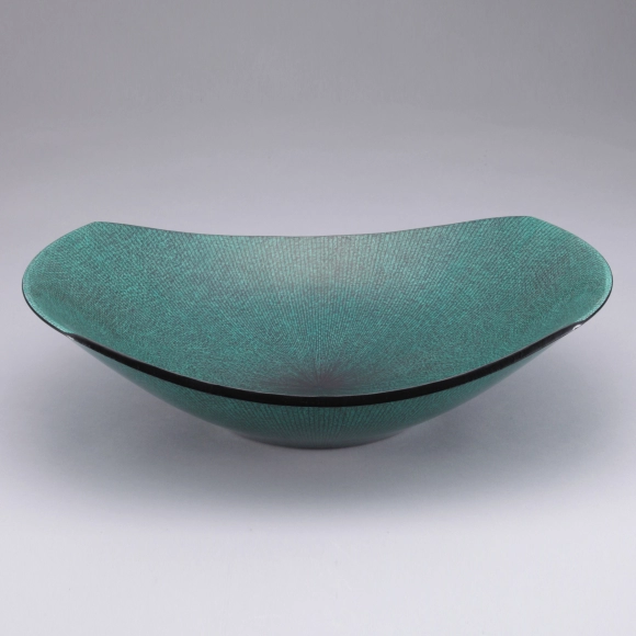 Green bowl with neatly aligned line design