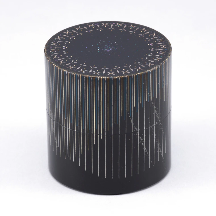 photo Tea Container with Design in Chinkin "Sunlight"