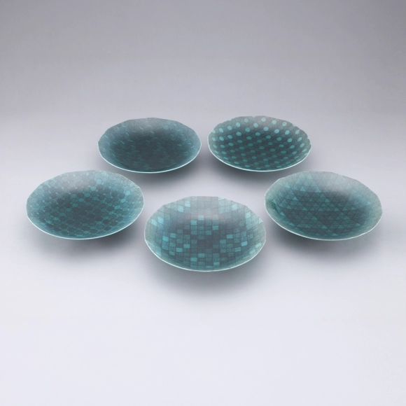 Set of Green Bowls with Neatly Aligned Line Design